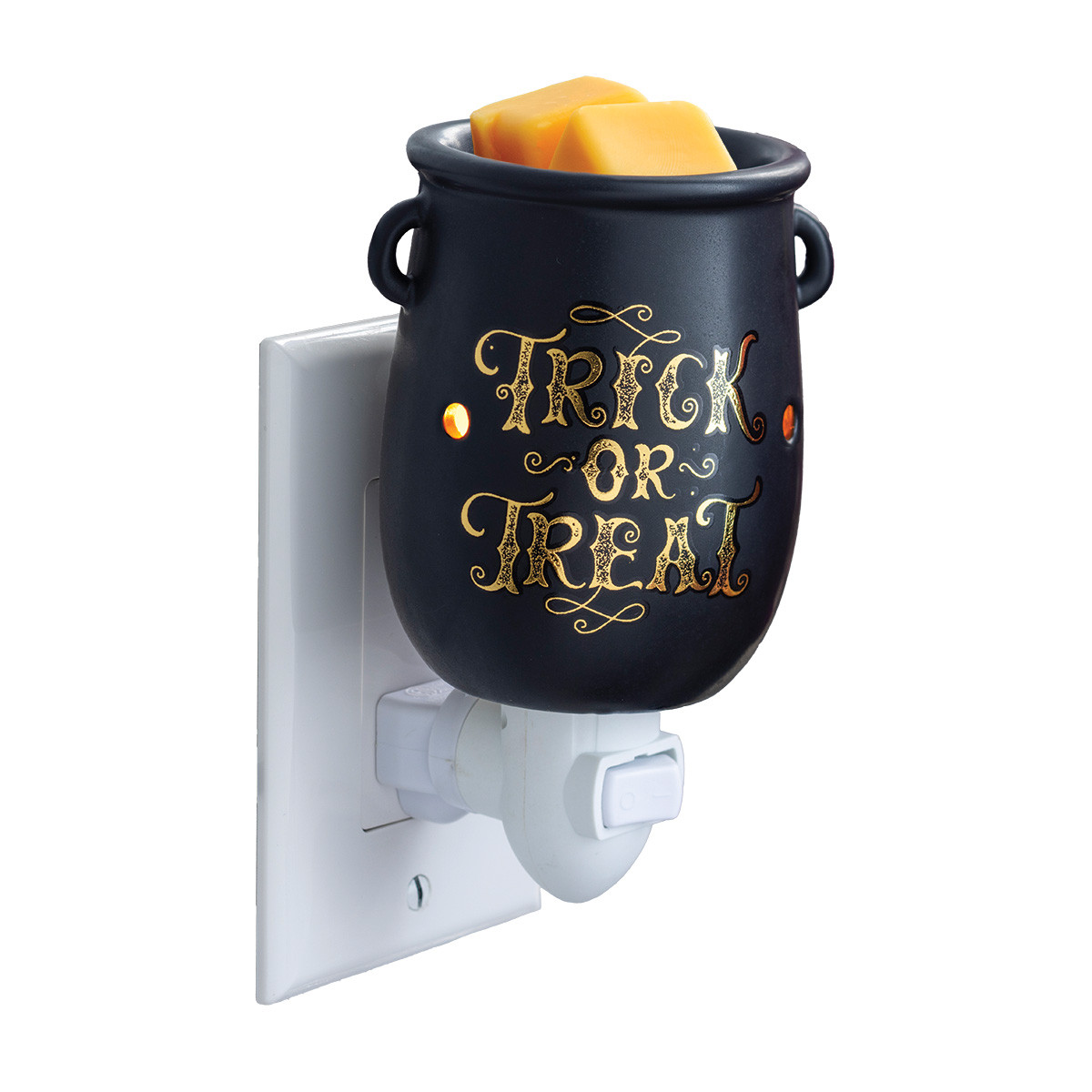 The Cauldron Pluggable Fragrance Warmer is the perfect way to add a spooky yet charming touch to your Halloween decor. With its sleek black cauldron design and "Trick or Treat" in decorative gold type, this warmer brings festive fun to any space.