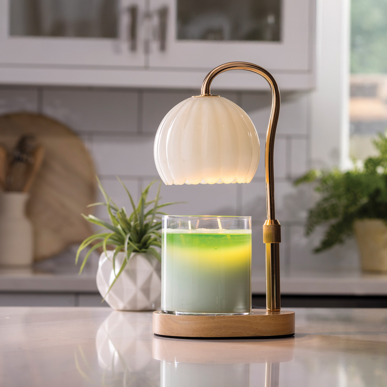 Vintage charm meets modern convenience in the Milk Glass Candle Warmer Lamp. The round milk glass shade features fluted and scalloped details.