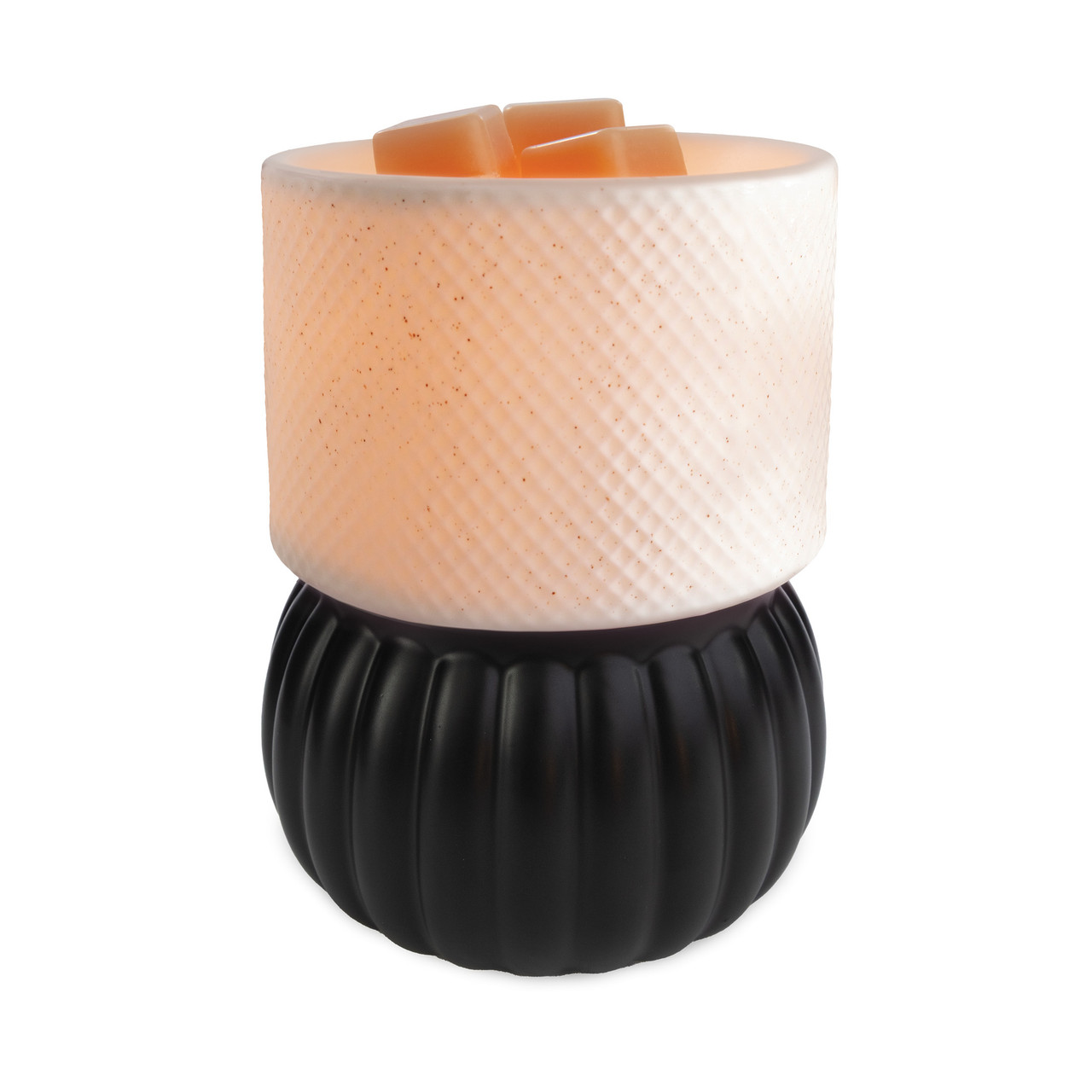 The Luxe Lamp Illumination Warmer features a chic contrast of matte black and textured white ceramic. This warmer makes a bold, stylish statement while effortlessly filling your space with fragrance.